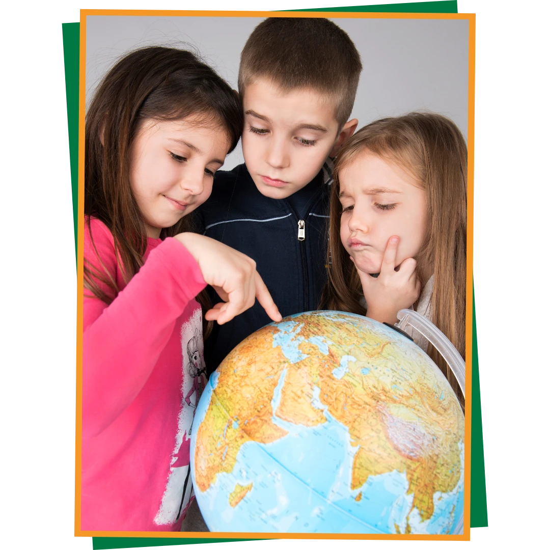 Student looking at a globe